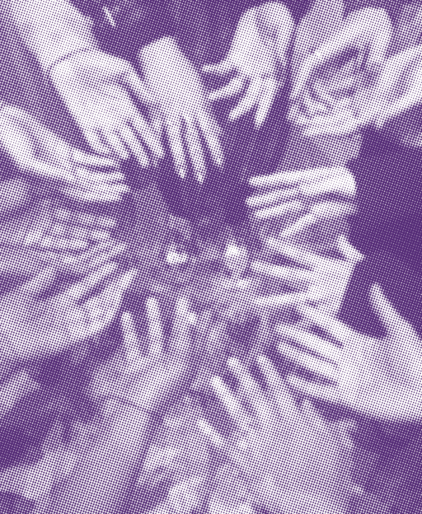 A circle of seven pairs of hands, all reaching into the center.