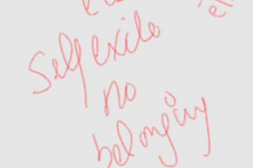 On a soft white background in soft red handwriting is a note scrawled along various angles: "Somewhere else, Self becoming, becoming somewhere else, no belonging”